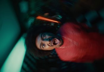 Movie still from “ONHA - KODAK” (2024), directed by Nitram – Extreme Close Up shot, Low angle