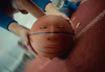 Movie still from “ONHA - KODAK” (2024), directed by Nitram – Extreme Close Up shot, High angle