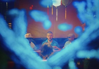 Movie still from “Dillon Francis, Good Times Ahead - LA On Acid” (2023), directed by Parker Seaman – Wide shot, Over the shoulder angle