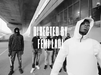Movie still from “Pa Salieu feat. BackRoad Gee - My Family” (2020), directed by Femi Ladi – Medium shot, Low angle