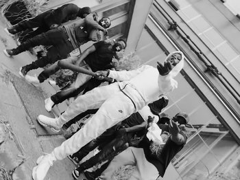 Movie still from “Pa Salieu feat. BackRoad Gee - My Family” (2020), directed by Femi Ladi – Medium shot, Low angle
