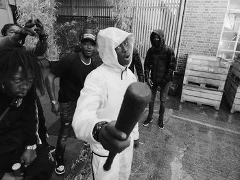 Movie still from “Pa Salieu feat. BackRoad Gee - My Family” (2020), directed by Femi Ladi – Medium shot, Low angle