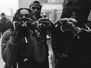 Movie still from “Pa Salieu feat. BackRoad Gee - My Family” (2020), directed by Femi Ladi – Medium shot, Low angle