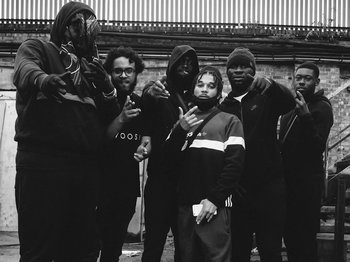 Movie still from “Pa Salieu feat. BackRoad Gee - My Family” (2020), directed by Femi Ladi – Wide shot, Low angle