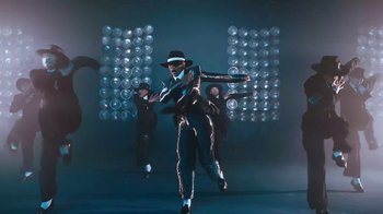 Movie still from “Victoria Monét - Alright” (2024), directed by Dave Meyers – Wide shot, Low angle