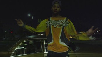 Movie still from “Yung Jake - Unfollow” (2014), directed by Yung Jake – Medium shot, Low angle