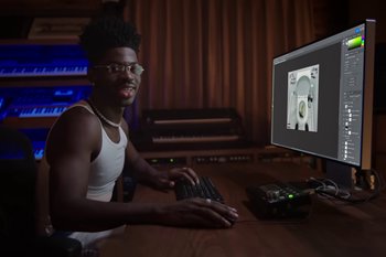 Movie still from “Lil Nas X, Youngboy Never Broke Again - Late To Da Party” (2022), directed by Gibson Hazard – Medium shot, Over the shoulder angle
