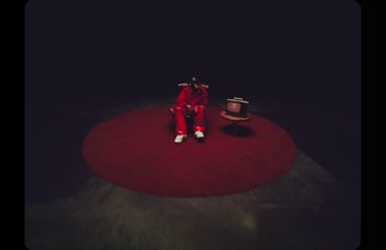 Movie still from “Rema - Trouble Maker” (2023), directed by Meji Alabi – Extreme Wide shot, High angle