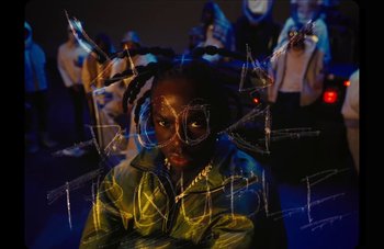 Movie still from “Rema - Trouble Maker” (2023), directed by Meji Alabi – Medium shot, Overhead angle