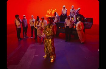 Movie still from “Rema - Trouble Maker” (2023), directed by Meji Alabi – Wide shot, Low angle