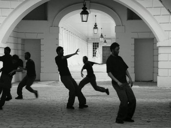 Movie still from “Botis Seva - Santo” (2022), directed by Freddie Leyden – Wide shot, Low angle