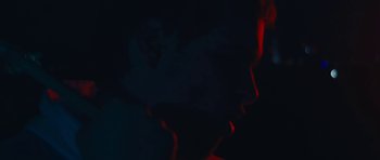 Movie still from “aexattack - Next Year” (2021), directed by Jetski – Extreme Close Up shot, Low angle