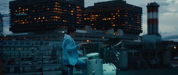 Movie still from “aexattack - Next Year” (2021), directed by Jetski – Wide shot, Low angle