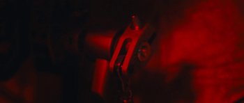 Movie still from “aexattack - Next Year” (2021), directed by Jetski – Extreme Close Up shot, Overhead angle