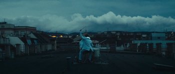 Movie still from “aexattack - Next Year” (2021), directed by Jetski – Extreme Wide shot, Low angle