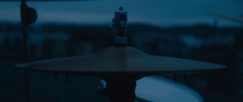 Movie still from “aexattack - Next Year” (2021), directed by Jetski – Extreme Close Up shot, Overhead angle