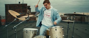 Movie still from “aexattack - Next Year” (2021), directed by Jetski – Medium shot, Low angle