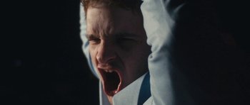 Movie still from “aexattack - Next Year” (2021), directed by Jetski – Extreme Close Up shot, Low angle