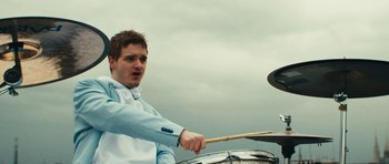 Movie still from “aexattack - Next Year” (2021), directed by Jetski – Medium shot, Low angle