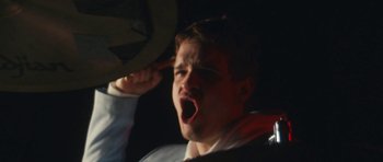 Movie still from “aexattack - Next Year” (2021), directed by Jetski – Extreme Close Up shot, Low angle