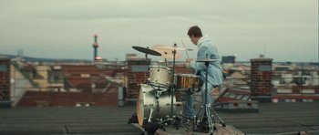 Movie still from “aexattack - Next Year” (2021), directed by Jetski – Wide shot, Low angle