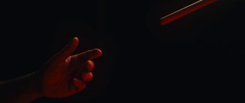 Movie still from “aexattack - Next Year” (2021), directed by Jetski – Extreme Close Up shot, Low angle