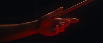 Movie still from “aexattack - Next Year” (2021), directed by Jetski – Extreme Close Up shot, Low angle