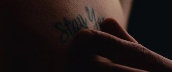 Movie still from “aexattack - Next Year” (2021), directed by Jetski – Extreme Close Up shot, Low angle