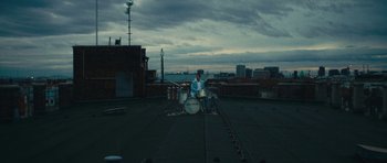 Movie still from “aexattack - Next Year” (2021), directed by Jetski – Extreme Wide shot, Low angle