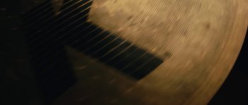 Movie still from “aexattack - Next Year” (2021), directed by Jetski – Extreme Close Up shot, Overhead angle