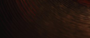 Movie still from “aexattack - Next Year” (2021), directed by Jetski – Extreme Close Up shot, Overhead angle