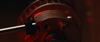 Movie still from “aexattack - Next Year” (2021), directed by Jetski – Extreme Close Up shot, Overhead angle