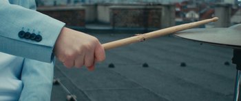 Movie still from “aexattack - Next Year” (2021), directed by Jetski – Extreme Close Up shot, Overhead angle