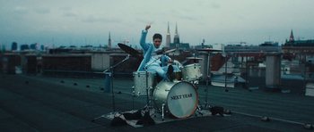 Movie still from “aexattack - Next Year” (2021), directed by Jetski – Wide shot, High angle