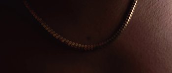 Movie still from “aexattack - Next Year” (2021), directed by Jetski – Extreme Close Up shot, High angle