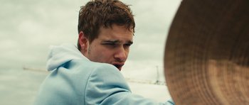 Movie still from “aexattack - Next Year” (2021), directed by Jetski – Close Up shot, Low angle