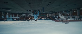 Movie still from “aexattack - Next Year” (2021), directed by Jetski – Extreme Wide shot, Overhead angle