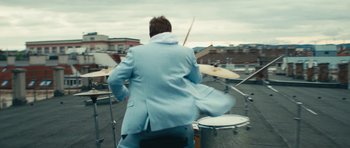 Movie still from “aexattack - Next Year” (2021), directed by Jetski – Wide shot, Low angle