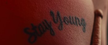 Movie still from “aexattack - Next Year” (2021), directed by Jetski – Extreme Close Up shot, High angle