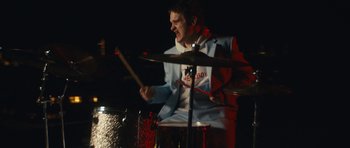 Movie still from “aexattack - Next Year” (2021), directed by Jetski – Medium shot, Low angle