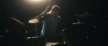 Movie still from “aexattack - Next Year” (2021), directed by Jetski – Medium shot, High angle