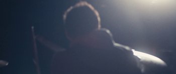 Movie still from “aexattack - Next Year” (2021), directed by Jetski – Extreme Close Up shot, Low angle