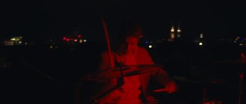 Movie still from “aexattack - Next Year” (2021), directed by Jetski – Medium shot, High angle