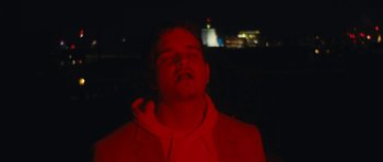 Movie still from “aexattack - Next Year” (2021), directed by Jetski – Close Up shot, Low angle