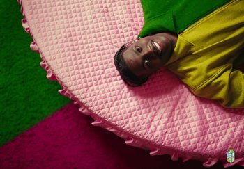 Movie still from “Lil Yachty - TESLA” (2023), directed by Cole Bennett – Medium shot, Overhead angle