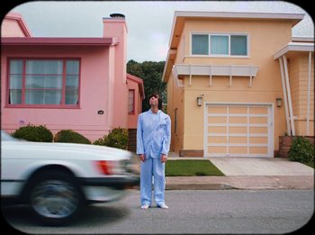 Movie still from “French Cassettes - White Noise” (2024), directed by Syra McCarthy – Wide shot, Low angle
