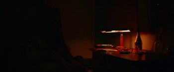 Movie still from “Naomi August - Inter Alia” (2023), directed by Daniel Lawrence Wilson – Medium shot, High angle