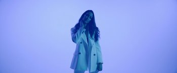 Movie still from “Naomi August - Inter Alia” (2023), directed by Daniel Lawrence Wilson – Medium shot, Low angle