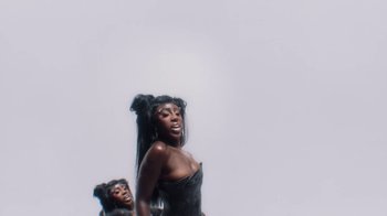 Movie still from “Bree Runway - Just Like That” (2024), directed by Pietro Biz Biasia – Medium shot, Overhead angle