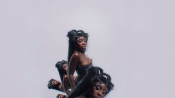 Movie still from “Bree Runway - Just Like That” (2024), directed by Pietro Biz Biasia – Medium shot, Overhead angle